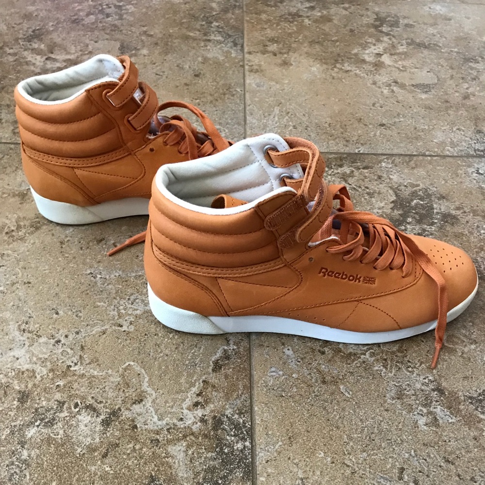 Rusty orange Reebok with the Strap